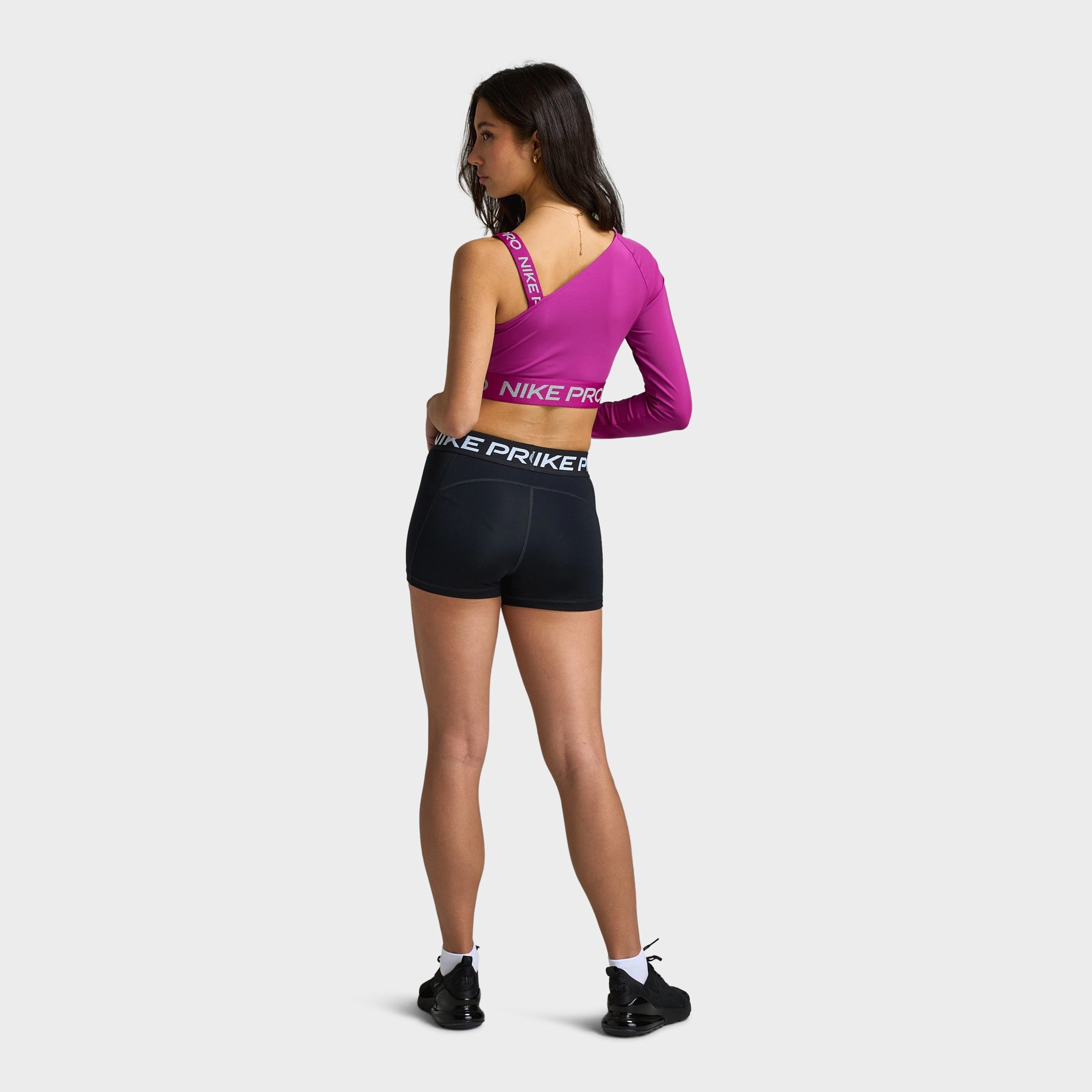 Nike Pro Shine Women's Dri-FIT Asymmetrical Cropped Top / Pink