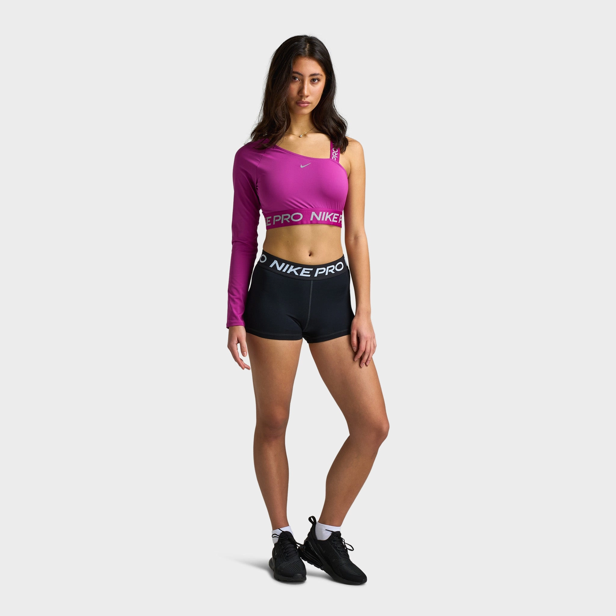 Nike Pro Shine Women's Dri-FIT Asymmetrical Cropped Top / Pink
